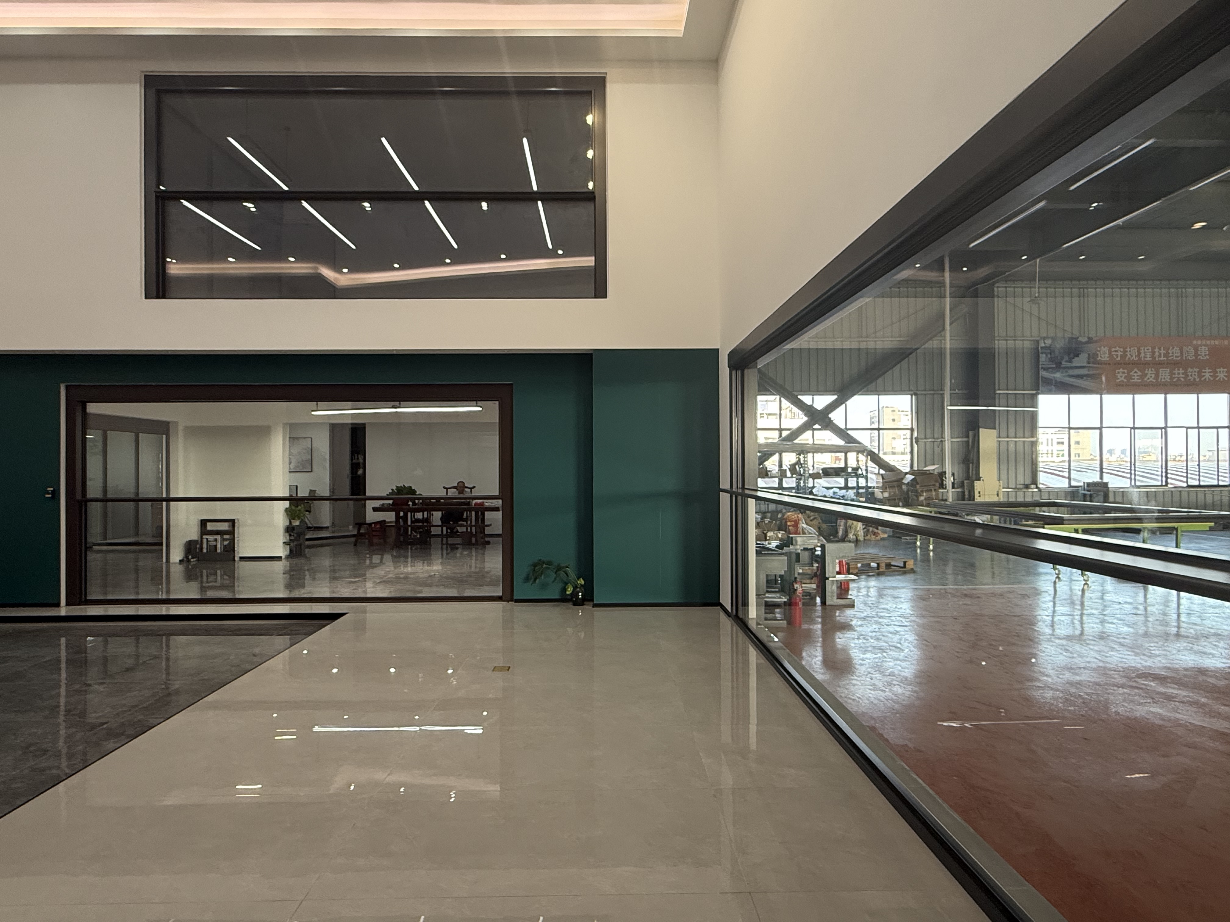 YIXIN motorized lift window installed in a showroom space